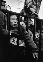 Protesters gather outside the Chisso factory demanding accountability for the Minamata disease mercury poisoning disaster in Japan.
